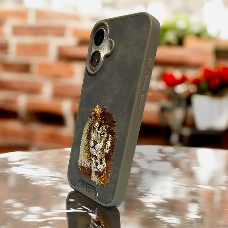 Regal Lion Family Embroidered Leather Case – iPhone 16